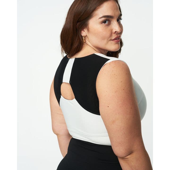 Studio product hero, posture-first framing